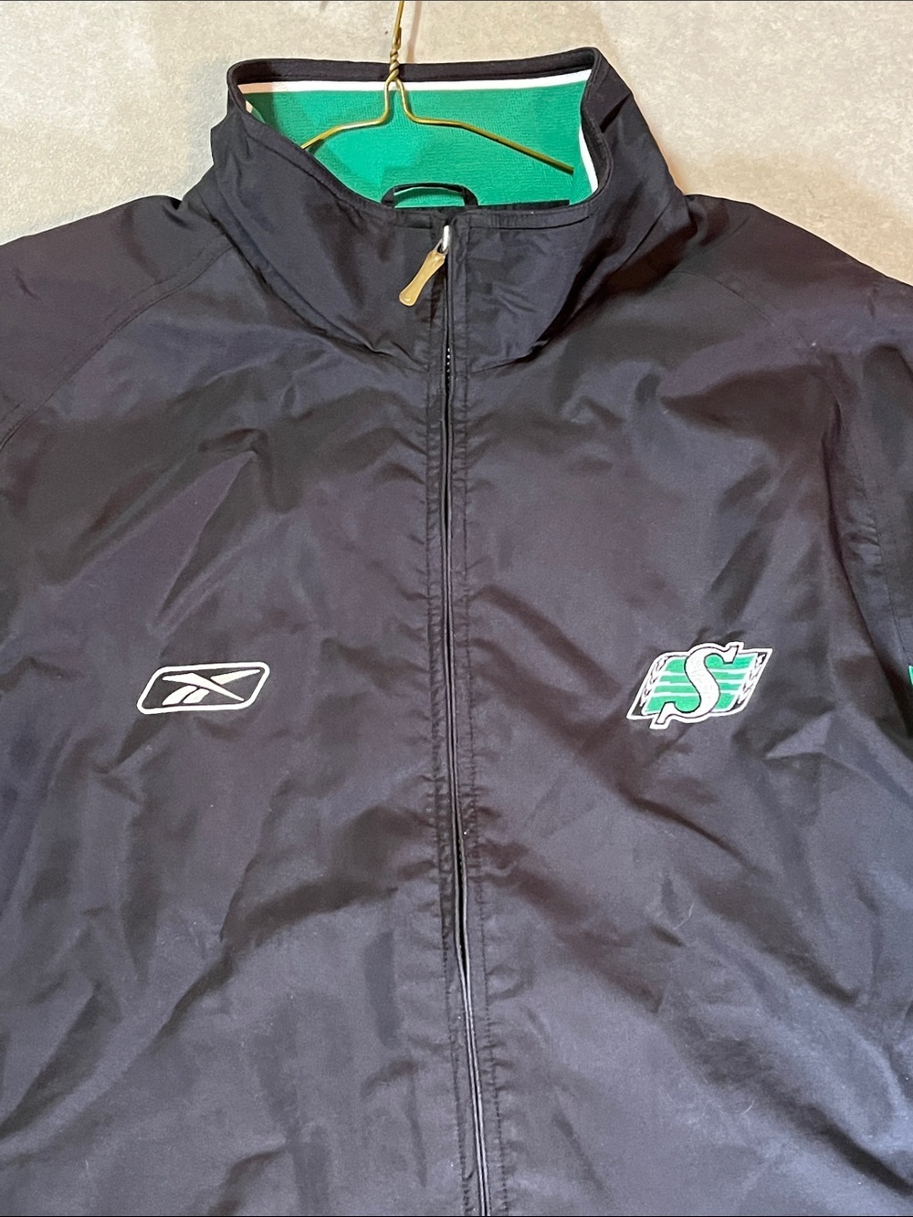 Roughriders Reebok CFL Windbreaker Jacket 
Large
Saskatchewan